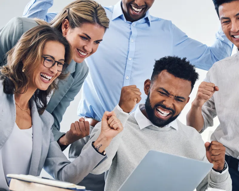 A team of accountants providing expert bookkeeping and accounting services while reviewing financial data in an office.