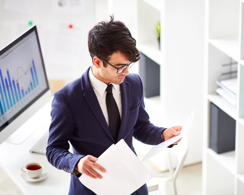 A team of experts discussing regulatory compliance projects, representing Greenfields' Compliance as a Service.