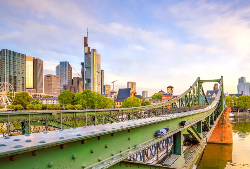 Frankfurt skyline and bridge representing Greenfields as a trusted German shelf company provider with local expertise.